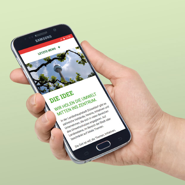 Websiteansicht von Umwelt-ins-Zentrum auf einem Smartphone.